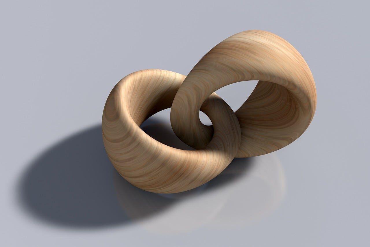 rings, wooden rings, intertwined, interconnected, connected, together, pair, rings, interconnected, interconnected, connected, connected, together, together, together, together, together